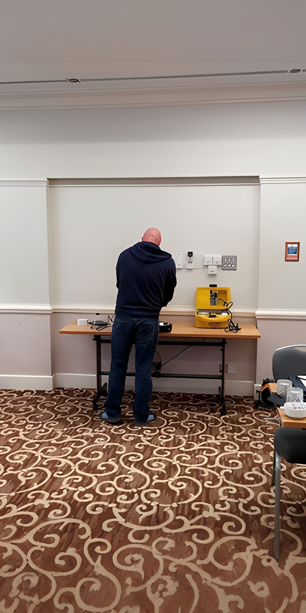 Delegate setting up electrical testing equipment during PAT testing course